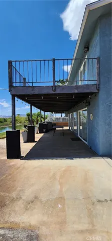 Multiple sliders provide direct access to the patio and back yard