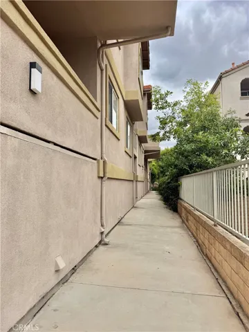 Walkway to unit from front of building