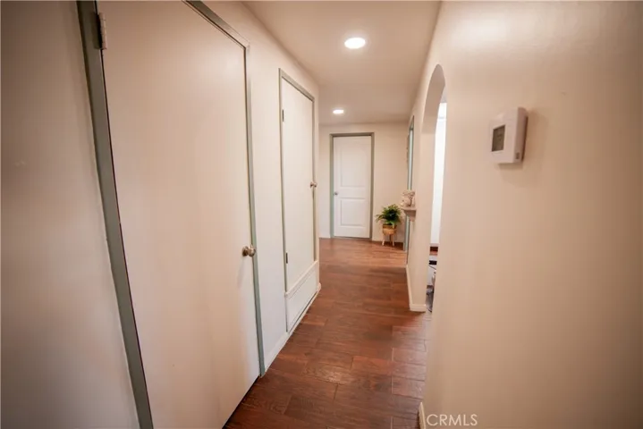 HALL SEPERATING PRIMARY FROM SECONDARY BEDROOMS