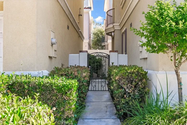 Entrance path to front door and rear yard/patio