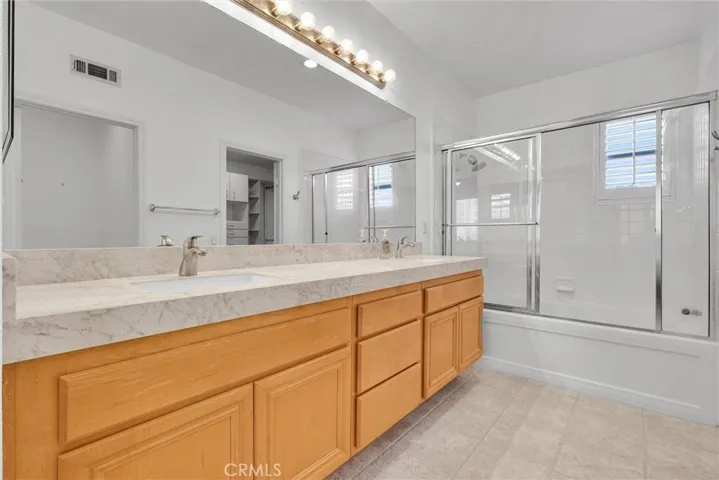 Primary suite bathroom dual vanities