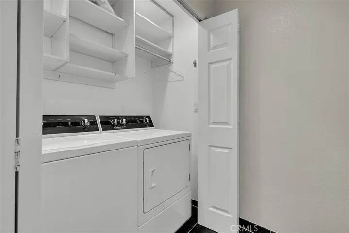 Laundry closet with included washer and dryer