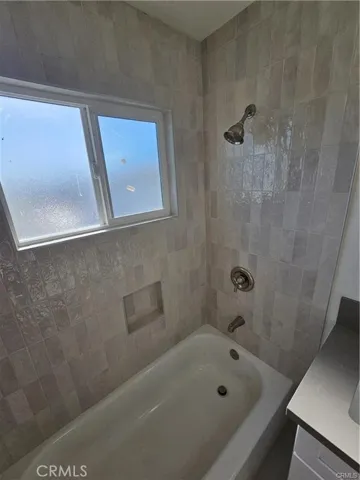 Photos may be of another unit in building, but same layout and same finish work