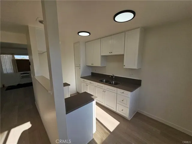 Photos may be of another unit in building, but same layout and same finish work