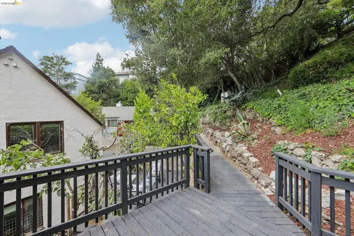 Wood-finish deck with dark railings