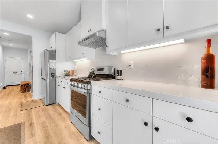 Bright under-cabinet lights kitchen.