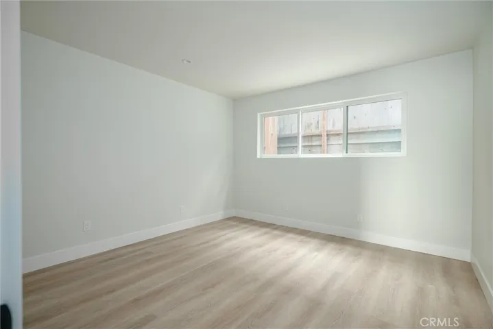 Another view of guest bedroom by front entry