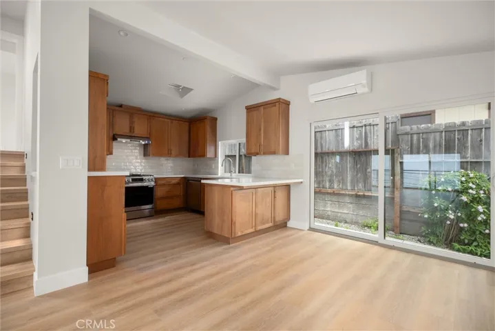 Dining area adjoins the kitchen and outdoor patio