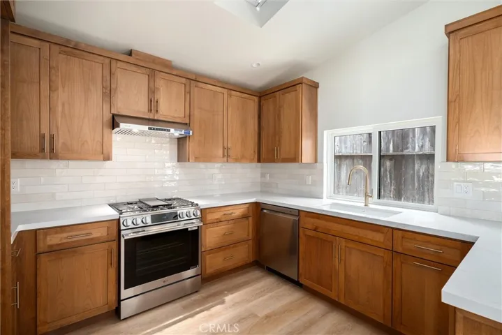 Beautiful brand new quartz counters and appliances, plus plenty of storage