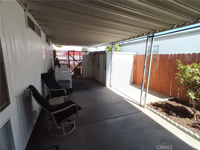 PATIO TO REAR YARD AND 2ND SHED AND STORAGE