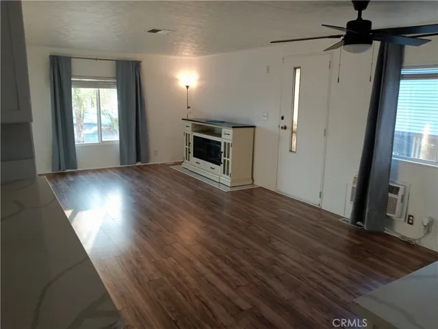 LIVING ROOM AND FRONT DOOR ENTRANCE