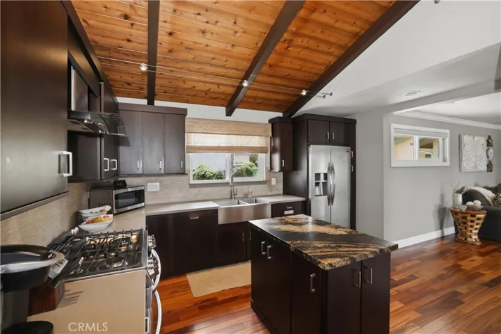 Beyond the kitchen to the right is the family room or multi-purpose room. At over 400 square feet you can use it as a theatre room, game room or just refer to it as your favorite room.