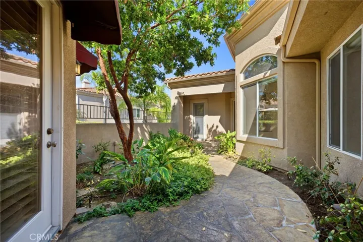 front courtyard with door to casita
