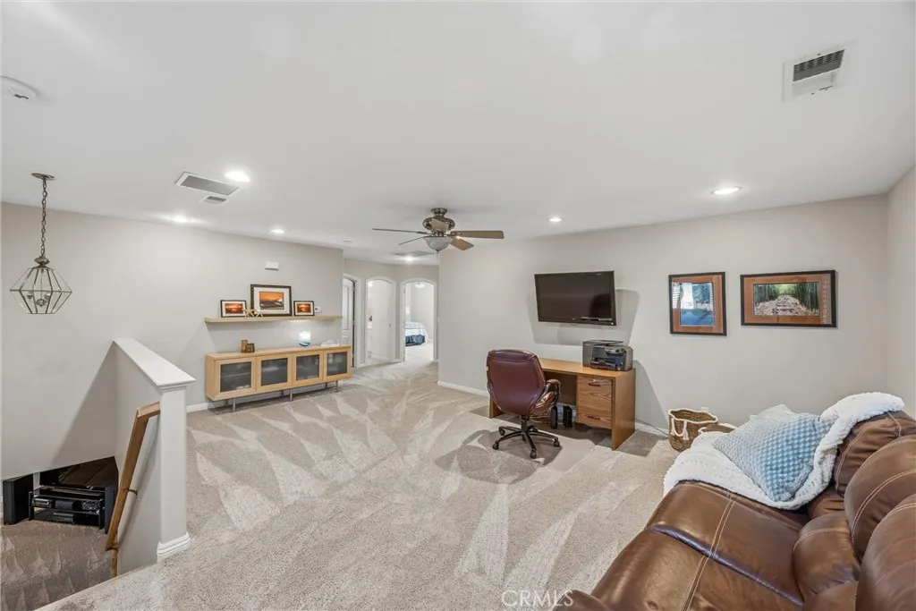 Spacious loft offering a versatile area for relaxation, entertainment, or a home office. Spacious loft offering a versatile area for relaxation, entertainment, or a home office.