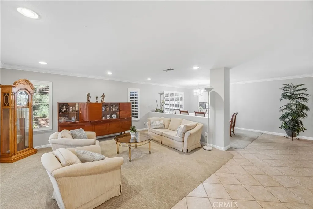 Welcoming entryway opens to a spacious living room with natural light and an inviting atmosphere. Welcoming entryway opens to a spacious living room with natural light and an inviting atmosphere.