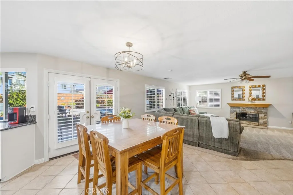 Comfortable dining space with built-in cabinetry and convenient access to the family room. Comfortable dining space with built-in cabinetry and convenient access to the family room.