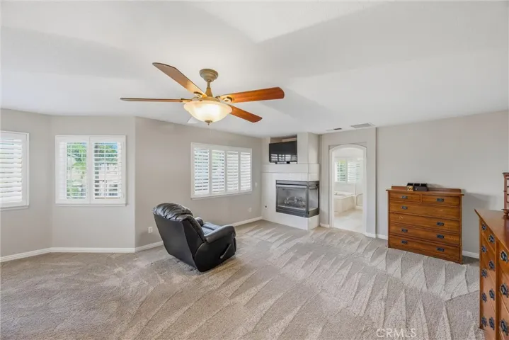 Generously sized primary bedroom with abundant natural light and plenty of room to unwind.