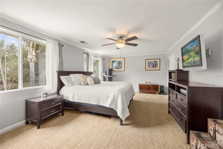 Retreat to the expansive primary suite, offering ample space for oversized furniture, a sitting area, and not one—but two walk-in closets.