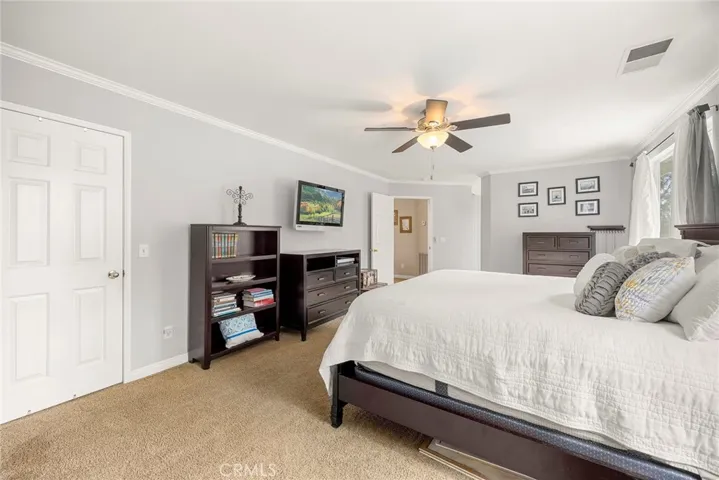 On the left is one of two walk-in closets.