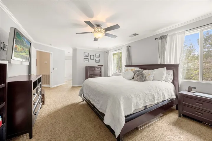 Another view of the primary bedroom.