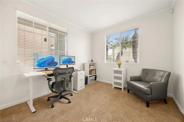 The versatile downstairs bedroom is currently used as a home office but easily transitions into a guest bedroom, fitness room, playroom, or whatever best fits your lifestyle.