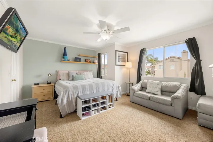 More than just a bedroom, this oversized 4th bedroom is ideal for older children or teens, offering room for sleeping, studying, lounging, and it's own walk-in closet.
