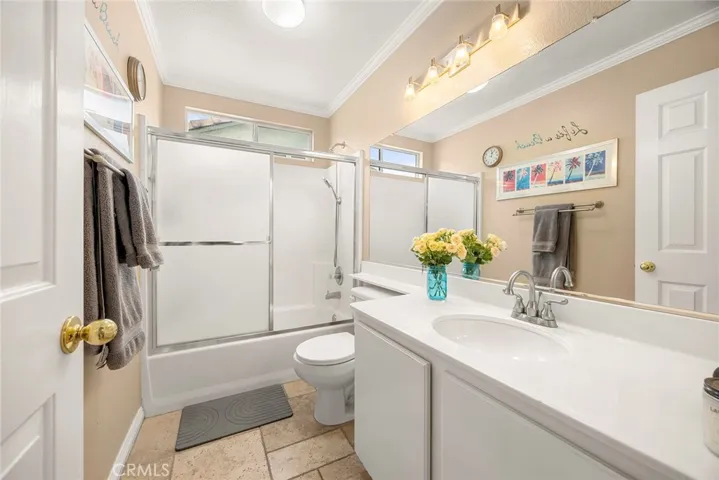 Serving the upstairs secondary bedrooms, this full bath is clean, functional, and ready for your personal touches and modern updates.