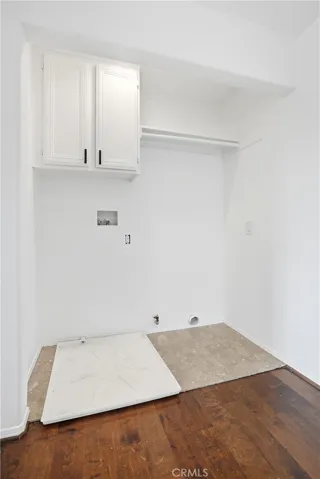 A dedicated laundry area, conveniently located upstairs.