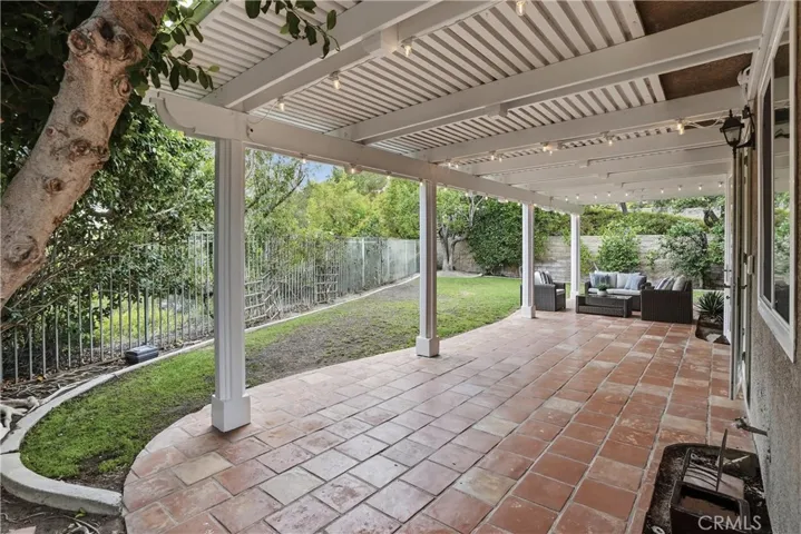 Friends, family, entertaining or just relaxing? All of it can be done on this large, private covered patio.