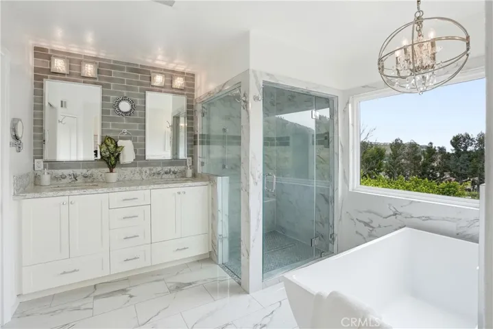 Enjoy this spa like primary bathroom space.