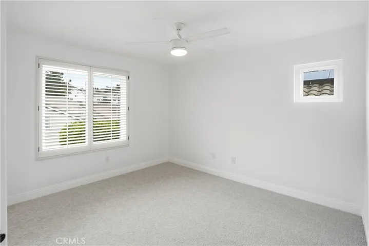 Upstairs bedroom 3 with 8' double mirrored closet doors.