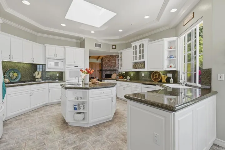 Well designed kitchen with large island and hand sink