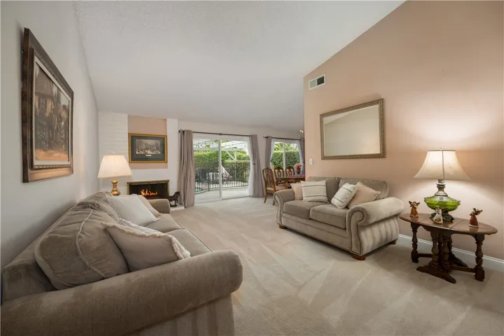 Bright living room with​​‌​​​​‌​​‌‌​​‌​​​‌‌​​​‌​​‌‌​​‌‌​​‌‌​​​​ fireplace