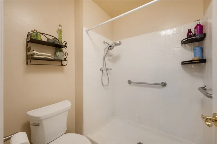 Offers a walk in shower with safety rails