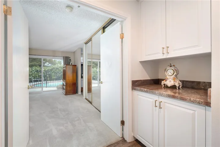 From the wide hallway, double doors open to the Large Primary Bedroom