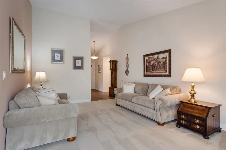 Living Room is adjacent to the Entry area