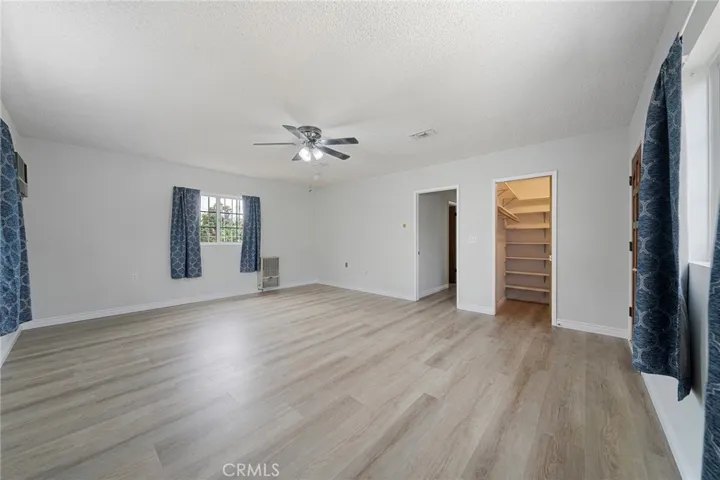 Back 4th bedroom has a walk-in closet and it's own entrance from the backyard.