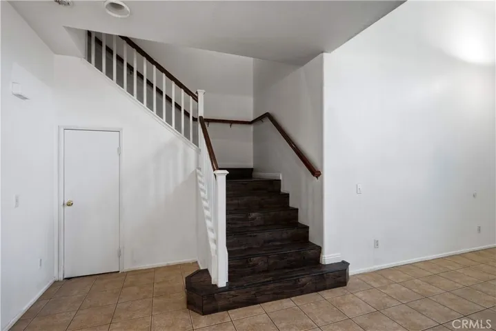 Stairs and coat closet