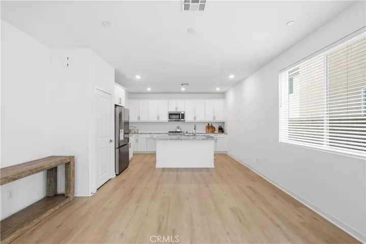 Kitchen looking through eating area