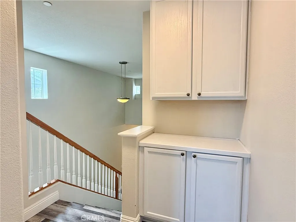 Linen cabinets at top of stairs outside bedrooms