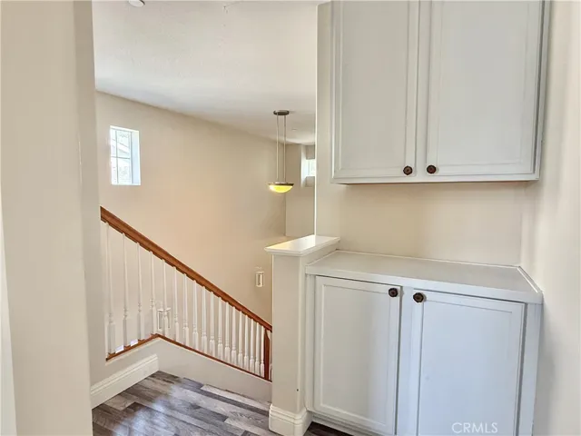 Linen cabinets at top of stairs outside bedrooms