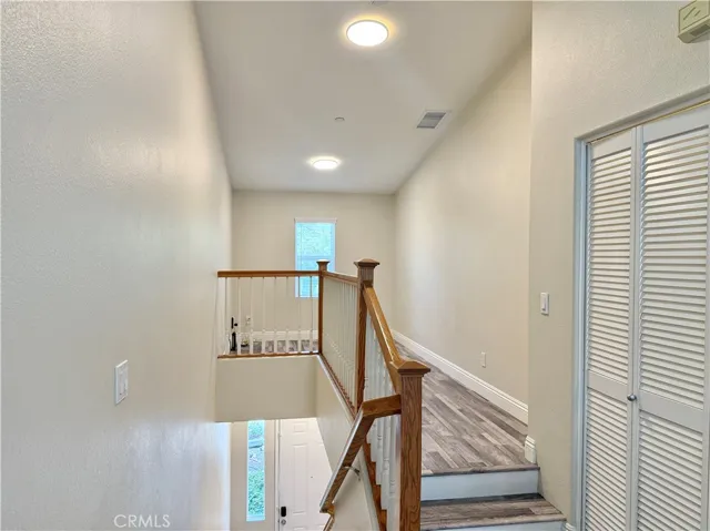 Laundry closet near loft