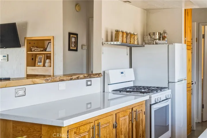 Kitchen with included refrigerator