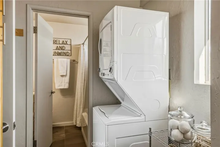 Laundry area. Stackable unit included