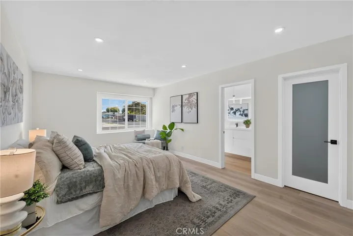 Primary suite with two walk-in closets