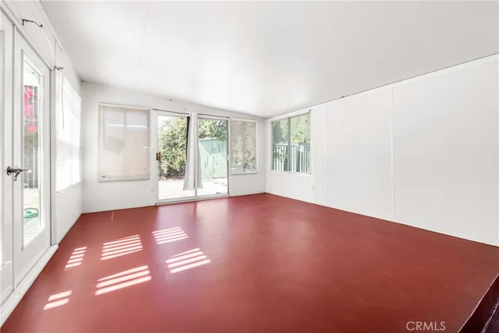 Sunroom has access to the backyard,