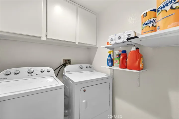 LAUNDRY DOWN, NEAR GARAGE ENTRANCE