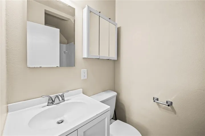 Bathroom #1 – Clean, bright bathroom with modern finishes.