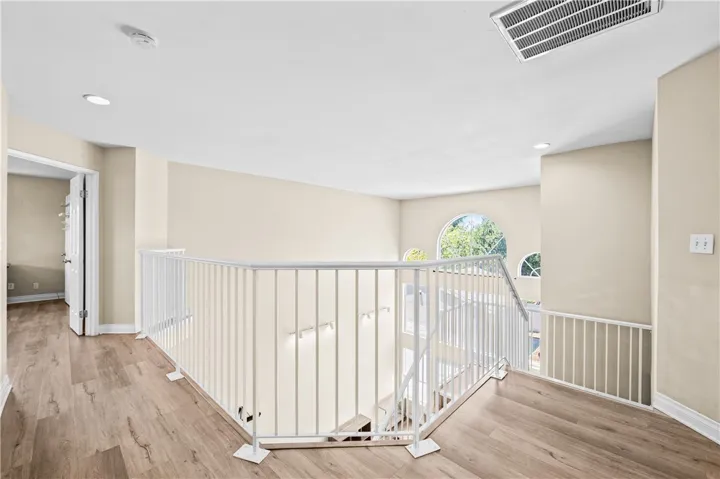 Loft overlooking the main living area—ideal for a shared study lounge.