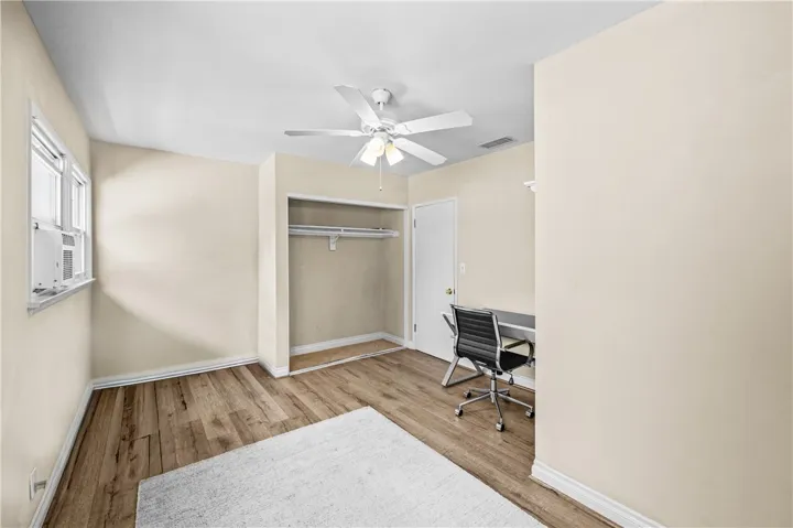Bedroom #1 – Offers generous closet space and natural light. Perfect private study retreat.